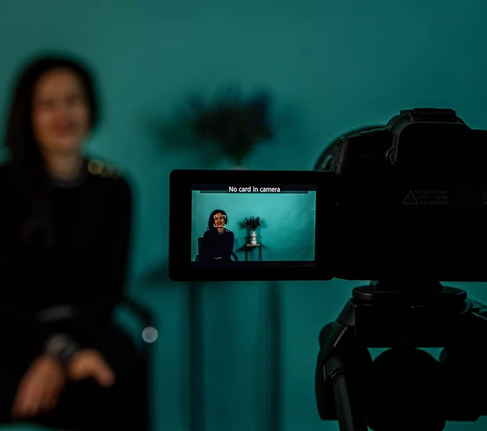 Content creator filming video in a studio